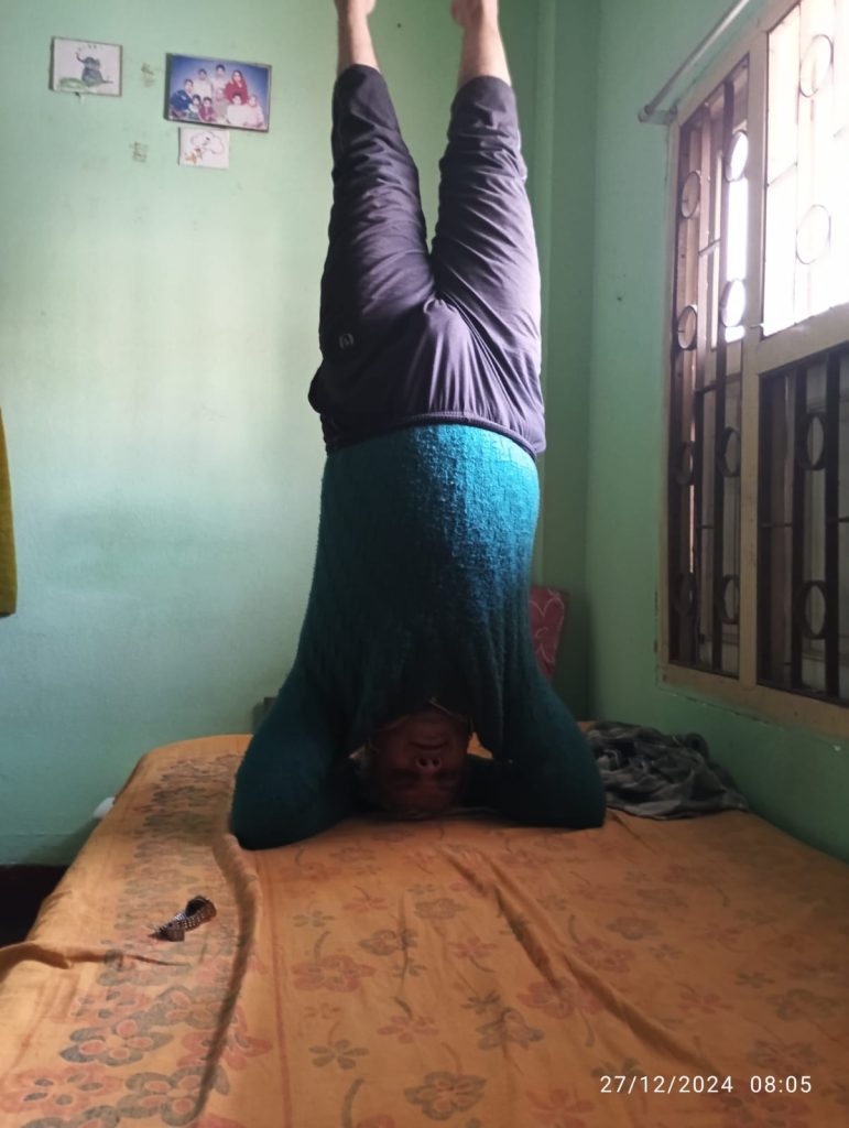 Sirshasan at bedroom in winter days on bed